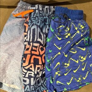 Three pair of boys swim trunks